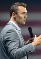 FILE - Turning Point USA Founder Charlie Kirk speaks before Republican presidential candidate former President Donald Trump arrives at the Turning Point Believers' Summit, July 26, 2024, in West Palm Beach, Fla. (AP Photo/Alex Brandon, File)